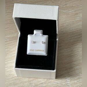 14K Gold Stud Earrings. AAA CZ